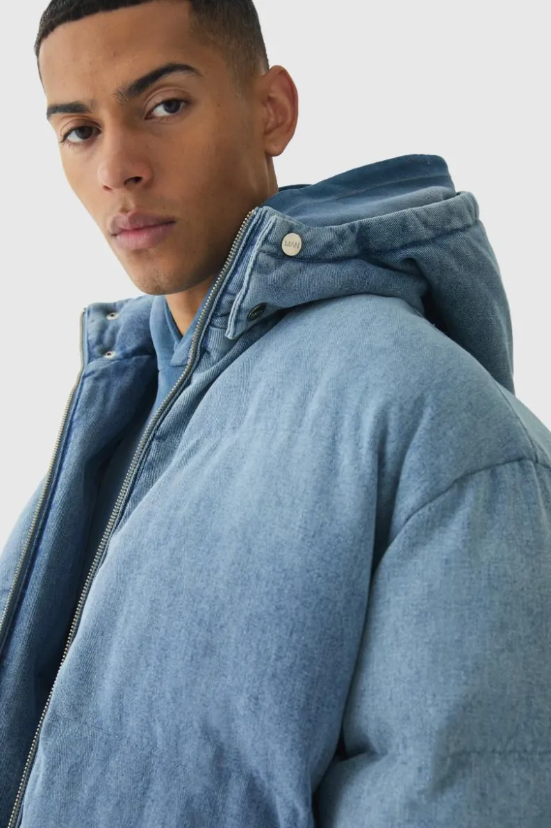 Store boohooMAN Oversized Funnel Neck Detachable Hood Denim Puffer Jacket light blue