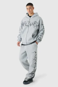 Shop boohooMAN Oversized Graffiti Zip Through Hooded Tracksuit grey marl