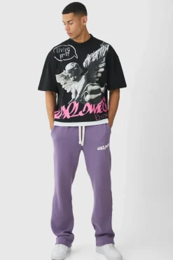 Store boohooMAN Oversized Graphic Faux Layer T-Shirt And Jogger Set plum