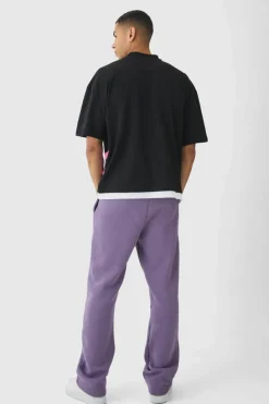Store boohooMAN Oversized Graphic Faux Layer T-Shirt And Jogger Set plum