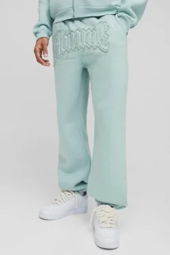 Store boohooMAN Oversized Homme Applique Cuffed Jogger light blue