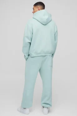 Store boohooMAN Oversized Homme Applique Cuffed Jogger light blue
