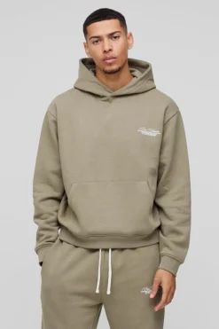 Shop boohooMAN Oversized Homme Hooded Split Hem Tracksuit khaki