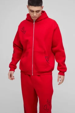 Shop boohooMAN Oversized Life Of The Party Slogan Tracksuit red