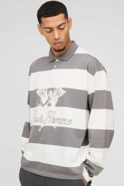 Shop boohooMAN Oversized Long Sleeve Stripe Homme Printed Rugby Polo charcoal
