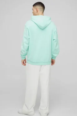 Store boohooMAN Oversized Loopback Raw Seams Worldwide Printed Hoodie turquoise