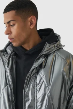 Shop boohooMAN Oversized Metallic Hooded Puffer In charcoal