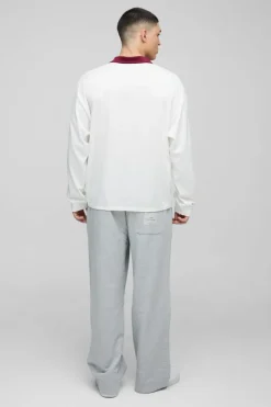 Shop boohooMAN Oversized Moto Long Sleeve Rugby Polo ecru