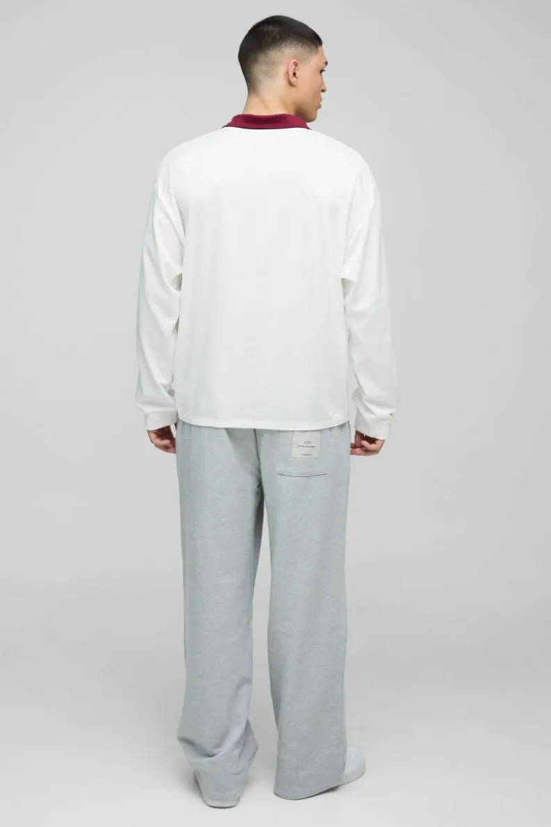 Shop boohooMAN Oversized Moto Long Sleeve Rugby Polo ecru