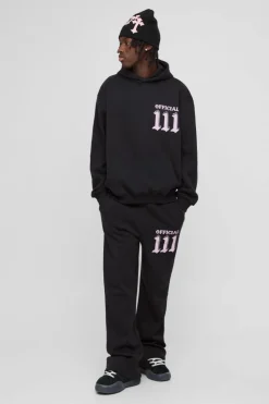 Shop boohooMAN Oversized Moto Puff & Diamante Print Hooded Tracksuit black