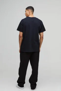 Shop boohooMAN Oversized Nirvana Floral Heart License T-Shirt black