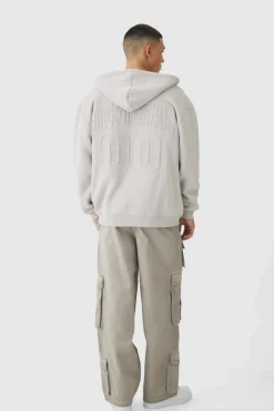 Shop boohooMAN Oversized Official Varsity Embossed Zip Through Hoodie light grey