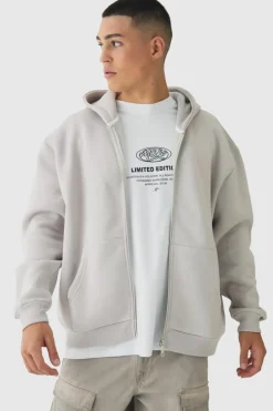 Shop boohooMAN Oversized Official Varsity Embossed Zip Through Hoodie light grey