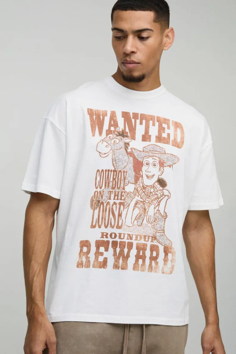 Shop boohooMAN Oversized Pixar Toy Story Woody License Print T-Shirt white