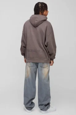 Shop boohooMAN Oversized Renaissance Box Graphic Washed Hoodie dark brown