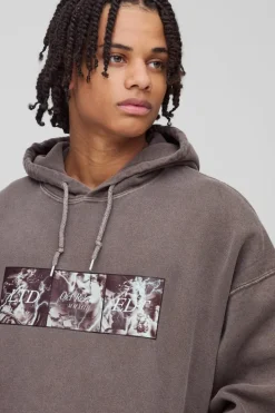 Shop boohooMAN Oversized Renaissance Box Graphic Washed Hoodie dark brown