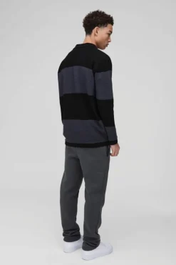 Shop boohooMAN Oversized Ribbed Colour Block Knitted Polo black