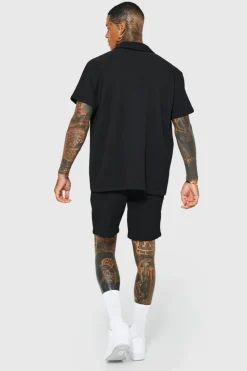 Shop boohooMAN Oversized Short Sleeve Pleated Shirt And Short black