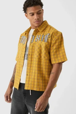 Shop boohooMAN Oversized Small Check Double Pocket Boxy Shirt yellow