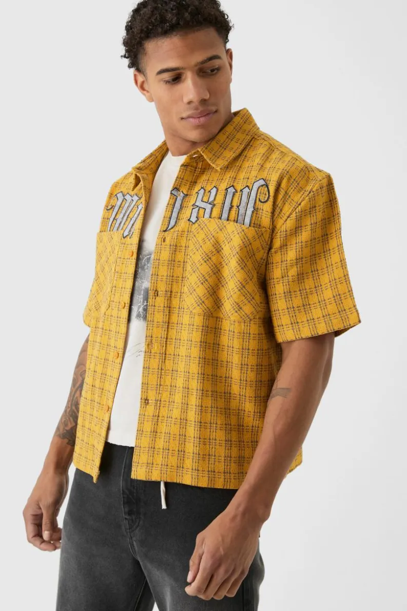 Shop boohooMAN Oversized Small Check Double Pocket Boxy Shirt yellow