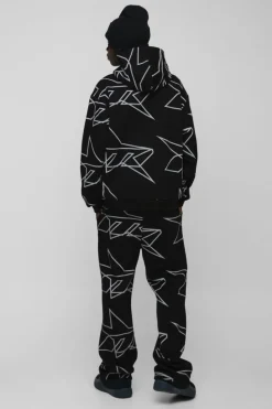 Online boohooMAN Oversized Star All Over Printed Gusset Flare Hooded Tracksuit black