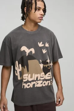 Shop boohooMAN Oversized Sunset Western Puff Print Washed Graphic T-Shirt brown