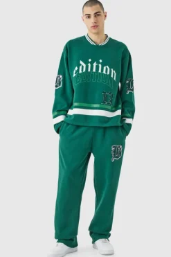 Shop boohooMAN Oversized Varsity Applique V Neck Sweatshirt Tracksuit forest