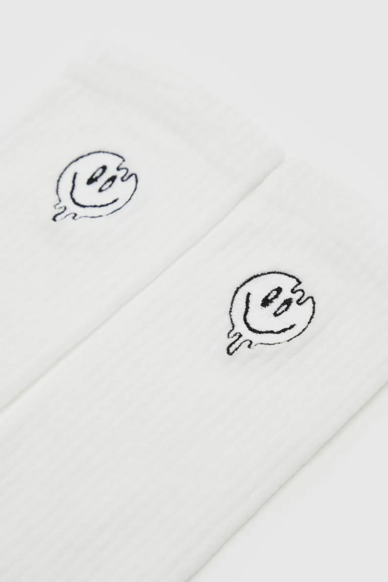 Store boohooMAN 1 Pack Embroidered Trippy Face Sock white