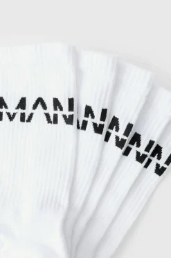 Shop boohooMAN 5 Pack MAN Dash Logo Plain Sport Socks white