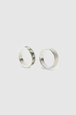 Shop boohooMAN 2 Pack Roman Lettering Rings silver