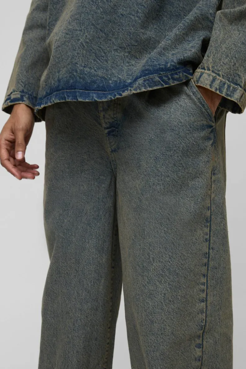 Store boohooMAN Pleated Baggy Jeans antique wash