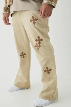 New boohooMAN Plus Cross Applique Gusset Detail Slim Flared Jeans stonewash