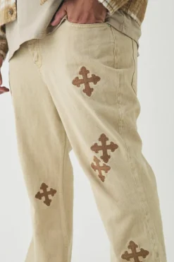 New boohooMAN Plus Cross Applique Gusset Detail Slim Flared Jeans stonewash