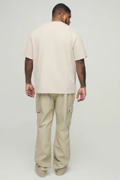 Best boohooMAN Plus Fixed Skinny Stacked Flare Pu Trouser stone