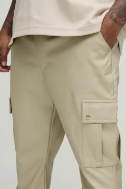 Best boohooMAN Plus Fixed Skinny Stacked Flare Pu Trouser stone