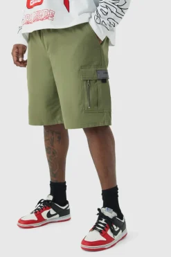 Store boohooMAN Plus Fixed Waist Twill Relaxed Cargo Zip Detail Tab Short khaki