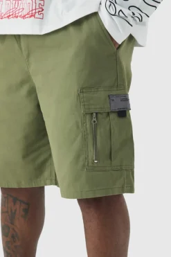 Store boohooMAN Plus Fixed Waist Twill Relaxed Cargo Zip Detail Tab Short khaki