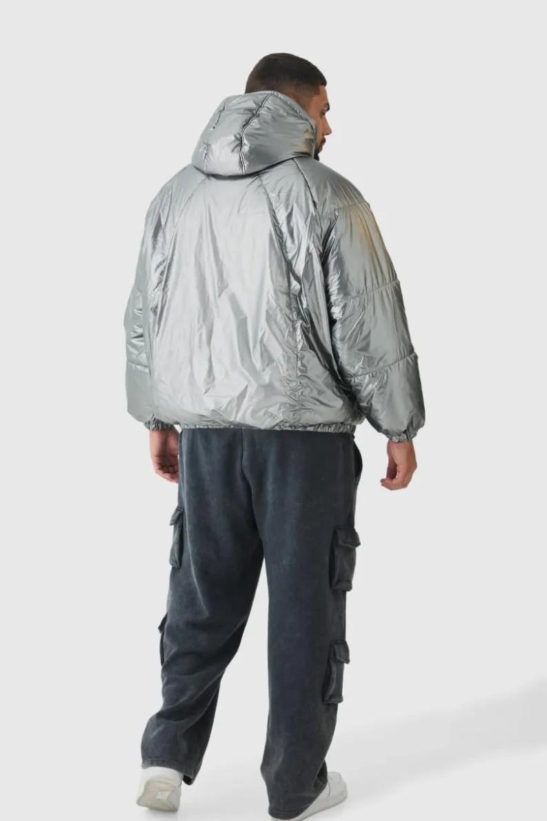 Store boohooMAN Plus Oversized Metallic Hooded Puffer Jacket In charcoal