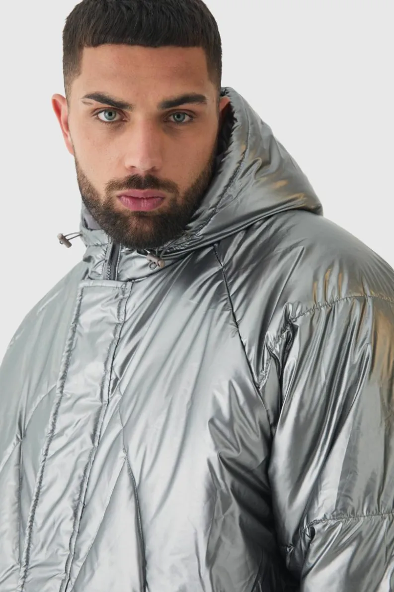 Store boohooMAN Plus Oversized Metallic Hooded Puffer Jacket In charcoal