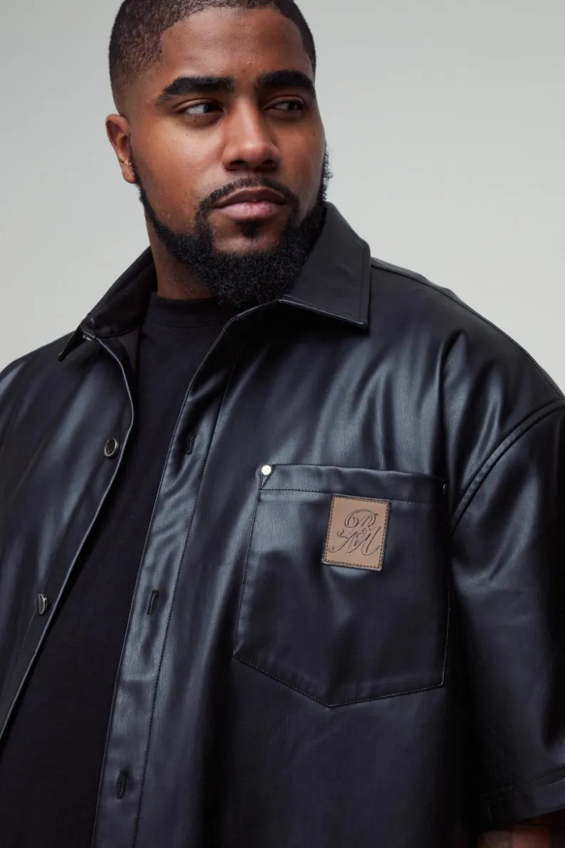Shop boohooMAN Plus Oversized PU Pocket Detail Shirt black