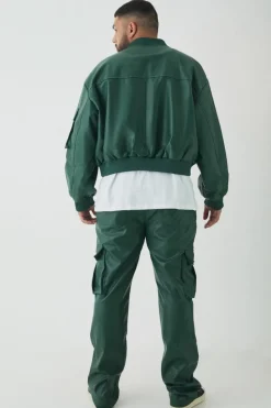 Shop boohooMAN Plus PU Boxy Oversized Cargo Bomber Jacket forest