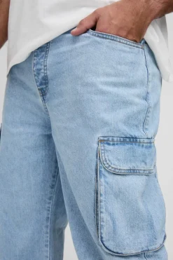 Shop boohooMAN Plus Relaxed Rigid Flare Cargo Jeans light blue