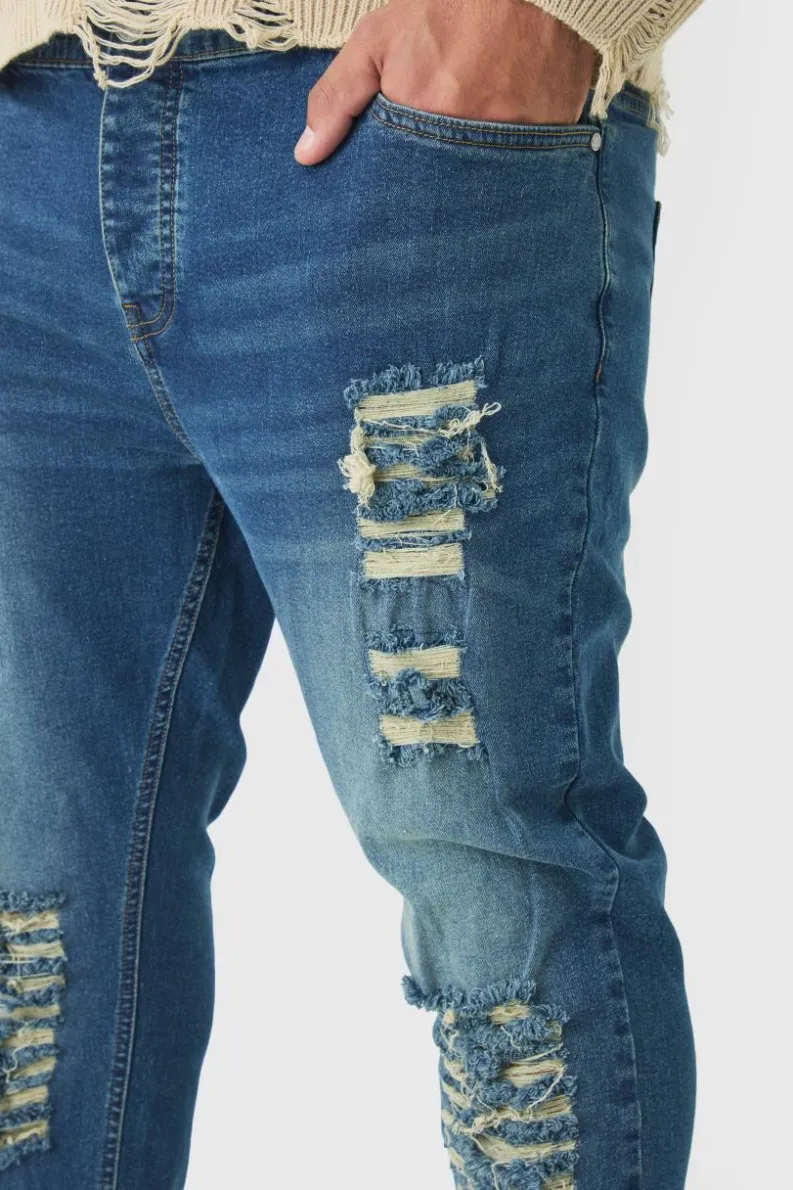 Cheap boohooMAN Plus Skinny Jeans With All Over Rips vintage blue