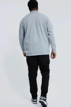 Shop boohooMAN Plus Skinny Stretch All Over Rip Jeans true black