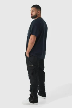 Shop boohooMAN Plus Slim Flare Zip Gusset Overdye Acid Wash Cargo Trouser In black