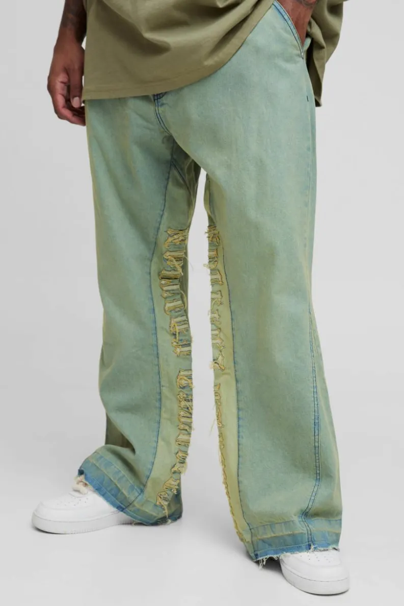 Shop boohooMAN Plus Tinted Applique Inner Gusset Slim Flared Jeans green