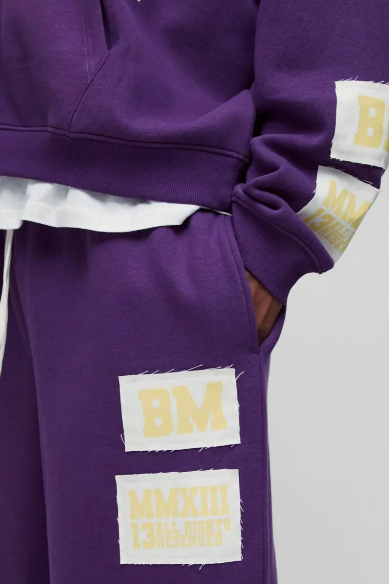 Cheap boohooMAN Plus Wide Fit Rhinestone Applique Jogger purple