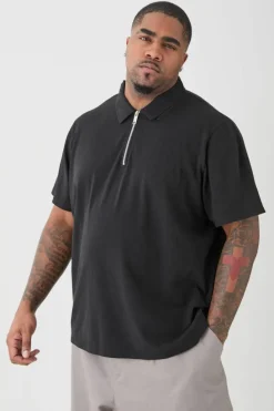 Shop boohooMAN Plus 1/4 Zip Pique Polo black