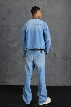 Shop boohooMAN P-Star Regular Fit Boxy Collarless Denim Jacket light blue