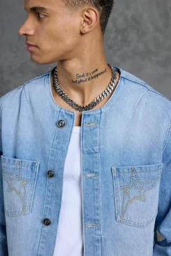 Shop boohooMAN P-Star Regular Fit Boxy Collarless Denim Jacket light blue